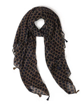 black spotted scarf on tan background